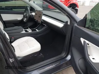 2021 Tesla Model Y Performance with VIN 5YJYGDEF4MF093227, listed as a IAAI auction lot 41603195 with Not Provided miles and . Bid and sale history available at carsss.com. Image 5.
