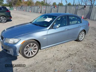 2011 BMW 3 Series 328i xDrive with VIN WBAPK5G51BNN29824, listed as a IAAI auction lot 40990352 with 171,133 mi miles and . Bid and sale history available at carsss.com. Image 2.