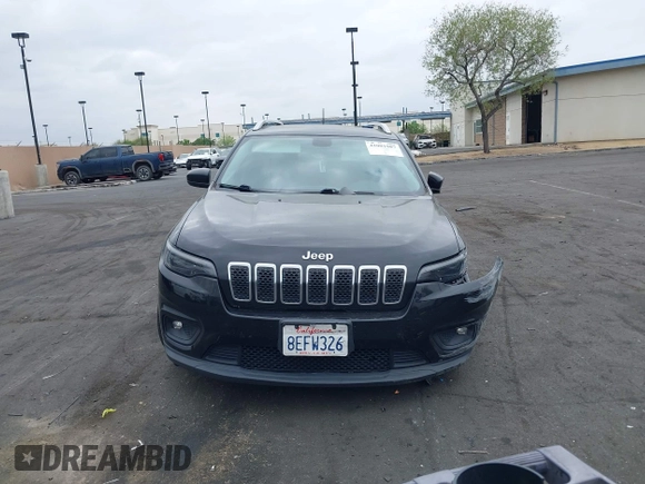 2019 Jeep Cherokee Latitude Plus z VIN 1C4PJLLB7KD129696, wystawiony jako IAAI lot #42001987 z przebiegiem 94 366 mil mil oraz . Historia ofert i sprzedaży dostępna na DreamBid. Obrazek 13.