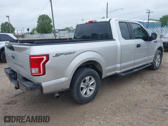 2015 Ford F-150 XL with VIN 1FTEX1C8XFKD19587, listed as a IAAI auction lot 42315673 with 220,319 mi miles and . Bid and sale history available at DreamBid. Image 4.