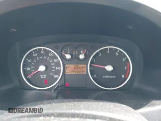 2003 Hyundai Tiburon GT z VIN KMHHN65FX3U076547, wystawiony jako IAAI lot #42015723 z przebiegiem 174 909 mil mil oraz . Historia ofert i sprzedaży dostępna na DreamBid. Obrazek 7.