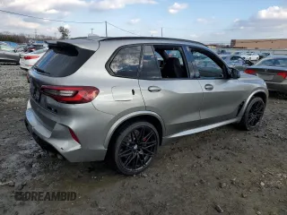 2023 BMW X5 M z VIN 5YMJU0C02P9N97072, wystawiony jako Copart lot #88469815 z przebiegiem 22 395 mil mil oraz Szkody całkowita. Historia ofert i sprzedaży dostępna na DreamBid. Obrazek 3.