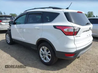 2018 Ford Escape SE with VIN 1FMCU9GD8JUB14879, listed as a IAAI auction lot 42156044 with 91,304 mi miles. Bid and sale history available at carsss.com. Image 3.