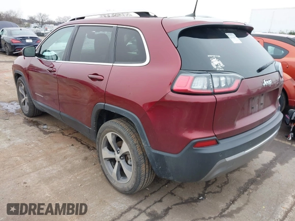 2020 Jeep Cherokee Limited with VIN 1C4PJLDB0LD570909, listed as a IAAI auction lot 41293813 with 61,492 mi miles. Bid and sale history available at carsss.com. Image 3.