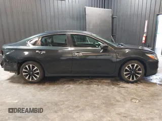2018 Nissan Altima SR with VIN 1N4AL3AP9JC121415, listed as a IAAI auction lot 41528034 with 136,793 mi miles and . Bid and sale history available at carsss.com. Image 14.