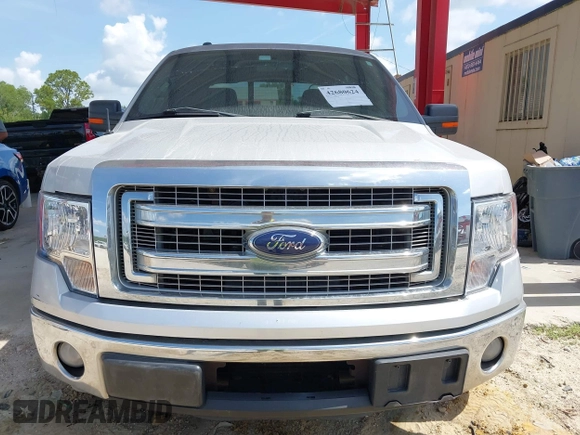 2013 Ford F-150 XL z VIN 1FTFW1CTXDKG41882, wystawiony jako IAAI lot #42680624 z przebiegiem 243 505 mil mil oraz . Historia ofert i sprzedaży dostępna na DreamBid. Obrazek 13.