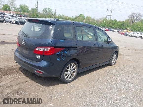 2014 Mazda 5 Grand Touring z VIN JM1CW2DL9E0171350, wystawiony jako IAAI lot #42113779 z przebiegiem 90 120 mil mil oraz . Historia ofert i sprzedaży dostępna na DreamBid. Obrazek 4.