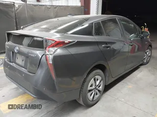2018 Toyota Prius Two with VIN JTDKARFU6J3553871, listed as a IAAI auction lot 41577636 with 118,715 mi miles. Bid and sale history available at carsss.com. Image 4.