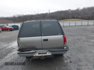 1999 GMC Yukon with VIN 1GKEK13R7XJ753243, listed as a IAAI auction lot 41231957 with 207,092 mi miles. Bid and sale history available at carsss.com. Image 16.