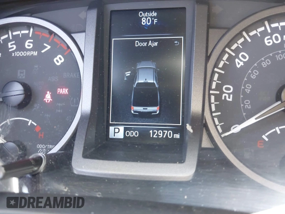 2023 Toyota Tacoma SR with VIN 3TMCZ5AN3PM590101, listed as a IAAI auction lot 42338670 with 12,970 mi miles and . Bid and sale history available at DreamBid. Image 15.