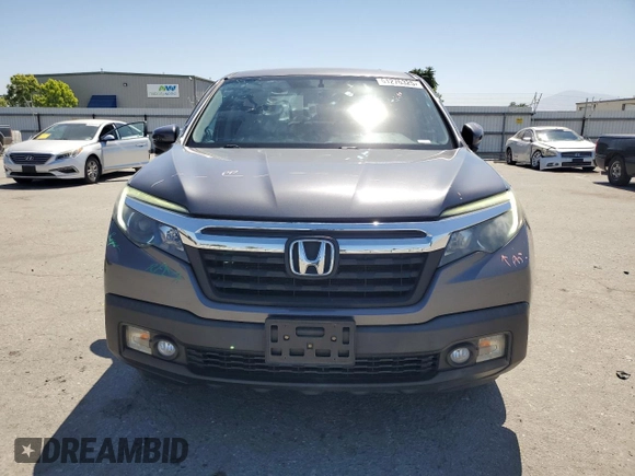 2019 Honda Ridgeline RTL-T with VIN 5FPYK2F68KB003907, listed as a Copart auction lot 61276325 with 59,612 mi miles and Salvage title. Bid and sale history available at DreamBid. Image 5.