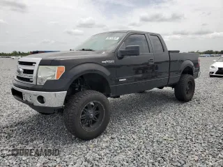 2013 Ford F-150 XL with VIN 1FTFX1CT1DFA93504, listed as a Copart auction lot 59713015 with 128,824 mi miles and Salvage title. Bid and sale history available at DreamBid. Image 1.