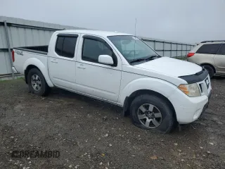 2010 Nissan Frontier Pro-4X with VIN 1N6AD0EV4AC404283, listed as a Copart auction lot 51495325 with 255,114 mi miles and Non repairable. Bid and sale history available at DreamBid. Image 4.