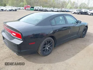 2012 Dodge Charger SE with VIN 2C3CDXBG1CH218814, listed as a IAAI auction lot 42125550 with 113,784 mi miles. Bid and sale history available at carsss.com. Image 4.