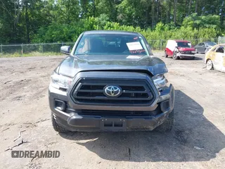 2022 Toyota Tacoma SR z VIN 3TYAX5GN5NT046897, wystawiony jako IAAI lot #42253604 z przebiegiem 69 246 mil mil oraz . Historia ofert i sprzedaży dostępna na DreamBid. Obrazek 12.
