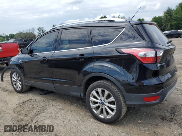 2017 Ford Escape Titanium with VIN 1FMCU9J9XHUD30408, listed as a Copart auction lot 58393844 with 81,779 mi miles and Salvage Title. Bid and sale history available at carsss.com. Image 2.