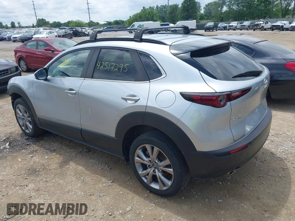 2021 Mazda CX-30 Select with VIN 3MVDMBBL1MM245514, listed as a IAAI auction lot 42517295 with 71,270 mi miles and . Bid and sale history available at DreamBid. Image 3.