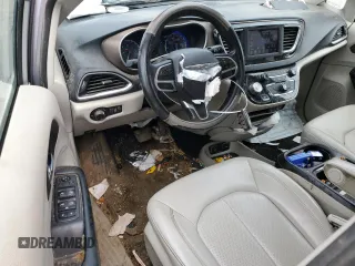 2021 Chrysler Voyager LXi with VIN 2C4RC1DG0MR521145, listed as a Copart auction lot 48062405 with 144,197 mi miles and Salvage Title. Bid and sale history available at DreamBid. Image 8.