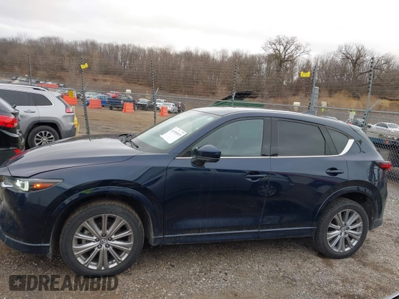 2023 Mazda CX-5 Signature with VIN JM3KFBXY5P0251046, listed as a IAAI auction lot 41505815 with 37,594 mi miles and . Bid and sale history available at carsss.com. Image 14.