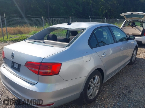 2015 Volkswagen Jetta S with VIN 3VW2K7AJ5FM251943, listed as a IAAI auction lot 42482891 with 74,649 mi miles and . Bid and sale history available at DreamBid. Image 4.