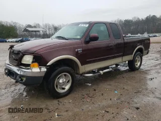 2000 Ford F-150 XL with VIN 1FTRX18L4YNA99427, listed as a Copart auction lot 49718795 with 0 mi miles and Salvage Title. Bid and sale history available at carsss.com. Image 1.