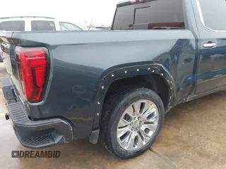 2020 GMC Sierra 1500 Denali z VIN 1GTU9FEL1LZ120581, wystawiony jako IAAI lot #41428827 z przebiegiem 97 917 mil mil oraz . Historia ofert i sprzedaży dostępna na DreamBid. Obrazek 6.