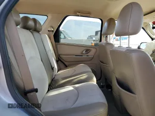 2005 Mercury Mariner Luxury z VIN 4M2YU56195DJ03528, wystawiony jako Copart lot #83315034 z przebiegiem 118 696 mil mil oraz Szkoda całkowita • Salvage title. Historia ofert i sprzedaży dostępna na DreamBid. Obrazek 11.