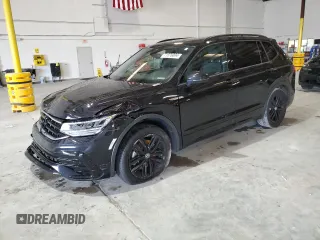 2022 Volkswagen Tiguan SE R-Line Black with VIN 3VVCB7AX1NM140818, listed as a Copart auction lot 71376004 with 29,190 mi miles and Salvage title. Bid and sale history available at DreamBid. Image 1.