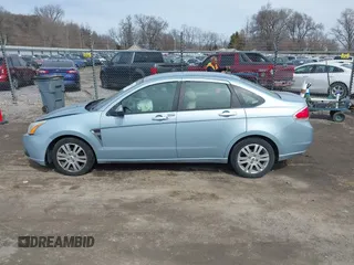 2009 Ford Focus SEL with VIN 1FAHP37N59W164619, listed as a IAAI auction lot 41762640 with 147,643 mi miles. Bid and sale history available at carsss.com. Image 14.
