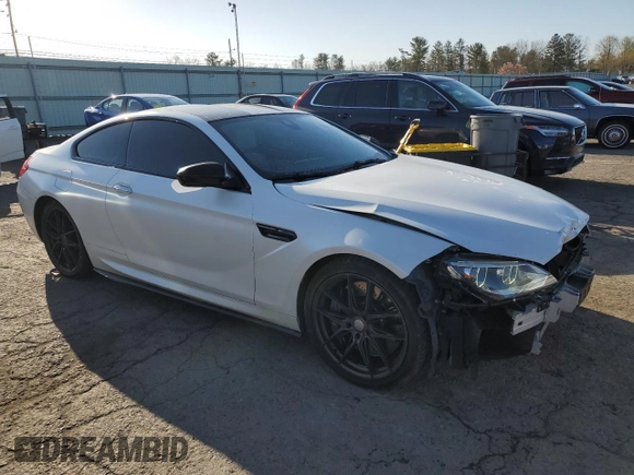 2015 BMW M6 z VIN WBSLX9C51FD160757, wystawiony jako Copart lot #51991315 z przebiegiem 71 133 mil mil oraz Szkoda całkowita • Salvage title. Historia ofert i sprzedaży dostępna na DreamBid. Obrazek 4.