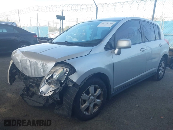 2009 Nissan Versa 1.8 SL with VIN 3N1BC13E29L406619, listed as a IAAI auction lot 41761728 with 115,510 mi miles. Bid and sale history available at carsss.com. Image 18.