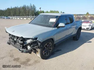 2022 Rivian R1T Adventure Package with VIN 7FCTGAAA5NN007018, listed as a IAAI auction lot 42018939 with 41,991 mi miles. Bid and sale history available at carsss.com. Image 21.