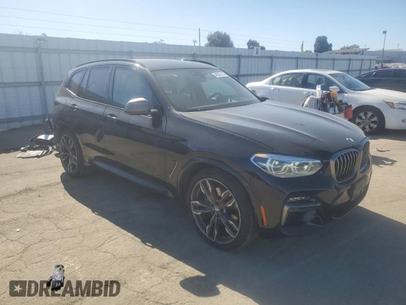 2020 BMW X3 M40i with VIN 5UXTY9C01L9B03869, listed as a Copart auction lot 46637515 with 57,052 mi miles and Salvage Title. Bid and sale history available at DreamBid. Image 4.
