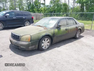2000 Cadillac DeVille z VIN 1G6KF5493YU264303, wystawiony jako IAAI lot #42394798 z przebiegiem 182 525 mil mil oraz . Historia ofert i sprzedaży dostępna na DreamBid. Obrazek 2.