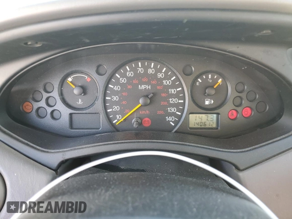 2002 Ford Focus LX with VIN 1FAFP33P52W126344, listed as a Copart auction lot 49757324 with 140,612 mi miles and Salvage Title. Bid and sale history available at DreamBid. Image 9.