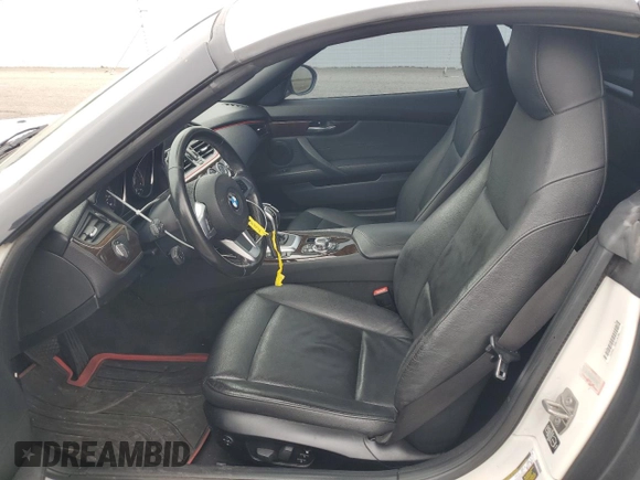 2013 BMW Z4 sDrive28i with VIN WBALL5C5XDJ104078, listed as a Copart auction lot 76118864 with 103,587 mi miles and Salvage Title. Bid and sale history available at carsss.com. Image 7.