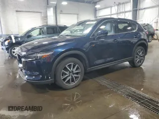 2018 Mazda CX-5 Grand Touring with VIN JM3KFBDM9J0346380, listed as a Copart auction lot 61934215 with 47,793 mi miles and Salvage title. Bid and sale history available at DreamBid. Image 1.