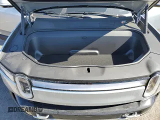 2024 Rivian R1S Adventure with VIN 7PDSGBBA4RN036045, listed as a Copart auction lot 74982414 with 9,256 mi miles and Salvage Title. Bid and sale history available at carsss.com. Image 12.