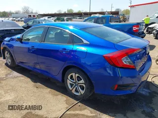 2018 Honda Civic LX with VIN 19XFC2F53JE020297, listed as a IAAI auction lot 42114807 with 124,058 mi miles and . Bid and sale history available at carsss.com. Image 3.