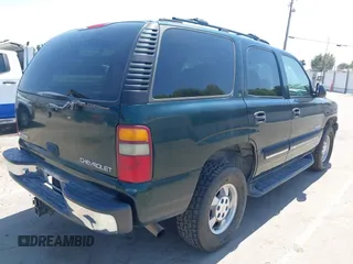 2001 Chevrolet Tahoe LT with VIN 1GNEK13T61R128369, listed as a IAAI auction lot 42437041 with 197,673 mi miles and . Bid and sale history available at DreamBid. Image 4.