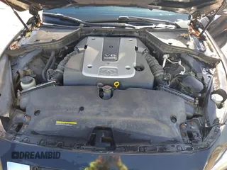 2015 Infiniti Q50 Premium with VIN JN1BV7AR2FM396677, listed as a IAAI auction lot 42017514 with 98,967 mi miles. Bid and sale history available at carsss.com. Image 10.