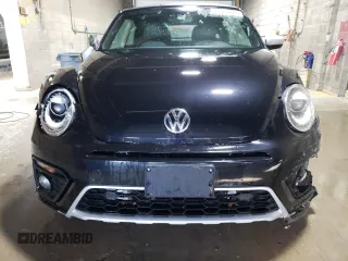 2017 Volkswagen Beetle with VIN 3VWT17AT2HM816046, listed as a Copart auction lot 77377274 with 27,948 mi miles and Salvage Title. Bid and sale history available at DreamBid. Image 5.