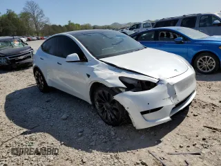 2021 Tesla Model Y Performance with VIN 5YJYGDEF7MF269221, listed as a Copart auction lot 52109785 with 61,619 mi miles and Salvage Title. Bid and sale history available at DreamBid. Image 4.