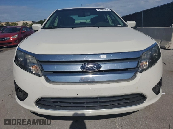 2012 Ford Fusion SE z VIN 3FAHP0HA7CR133859, wystawiony jako Copart lot #61153125 z przebiegiem 100 822 mil mil oraz Czysty tytuł • Clean title. Historia ofert i sprzedaży dostępna na DreamBid. Obrazek 5.