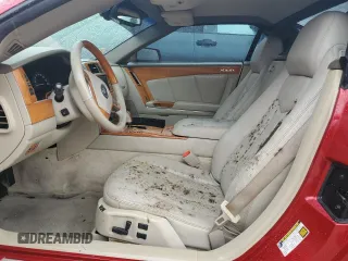 2005 Cadillac XLR z VIN 1G6YV34AX55600837, wystawiony jako Copart lot #75055604 z przebiegiem Nie podano mil oraz Szkody całkowita. Historia ofert i sprzedaży dostępna na DreamBid. Obrazek 7.