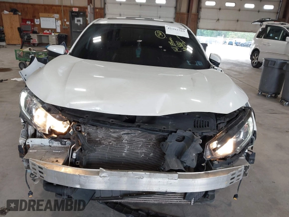 2018 Honda Civic EX-T z VIN JHMFC1F31JX009273, wystawiony jako IAAI lot #42393769 z przebiegiem 141 188 mil mil oraz . Historia ofert i sprzedaży dostępna na DreamBid. Obrazek 6.