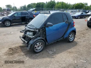 2009 Smart fortwo Pure with VIN WMEEJ31X79K331466, listed as a Copart auction lot 73485234 with 145,000 mi miles and Salvage Title. Bid and sale history available at carsss.com. Image 1.