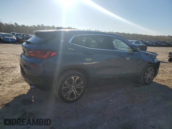 2022 BMW X2 xDrive28i with VIN WBXYJ1C0XN5T67566, listed as a Copart auction lot 86689864 with 42,496 mi miles and Salvage Title. Bid and sale history available at carsss.com. Image 3.