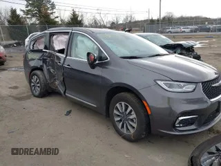 2023 Chrysler Pacifica Hybrid Limited with VIN 2C4RC1S70PR502988, listed as a IAAI auction lot 41690262 with 21,246 mi miles and . Bid and sale history available at DreamBid. Image 1.