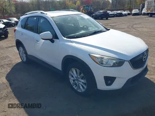 2013 Mazda CX-5 Grand Touring with VIN JM3KE4DE3D0156957, listed as a IAAI auction lot 42085443 with 146,990 mi miles. Bid and sale history available at carsss.com. Image 1.